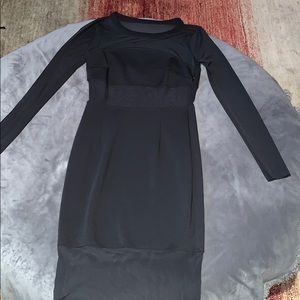 Women’s long sleeve black dress, mesh midriff.